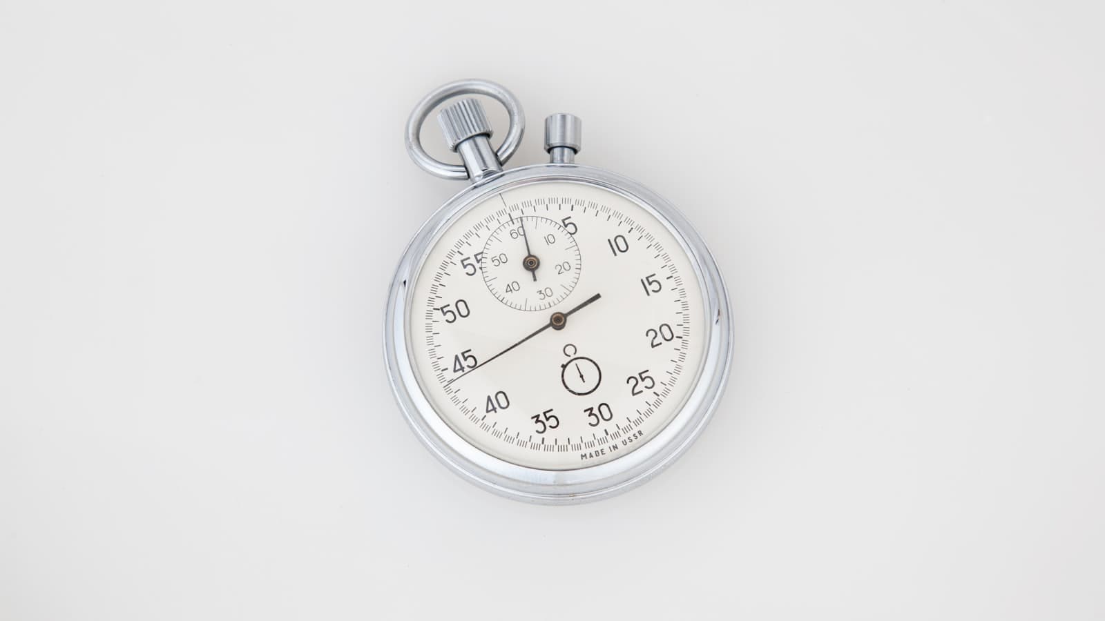 A close-up of an analogue watch face marking seconds
